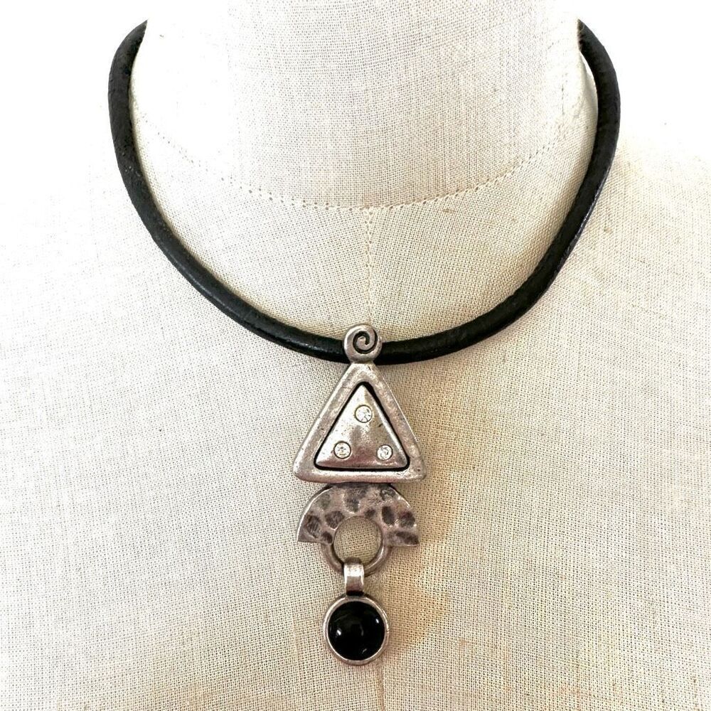 Silver tone and black pendant necklace on cord